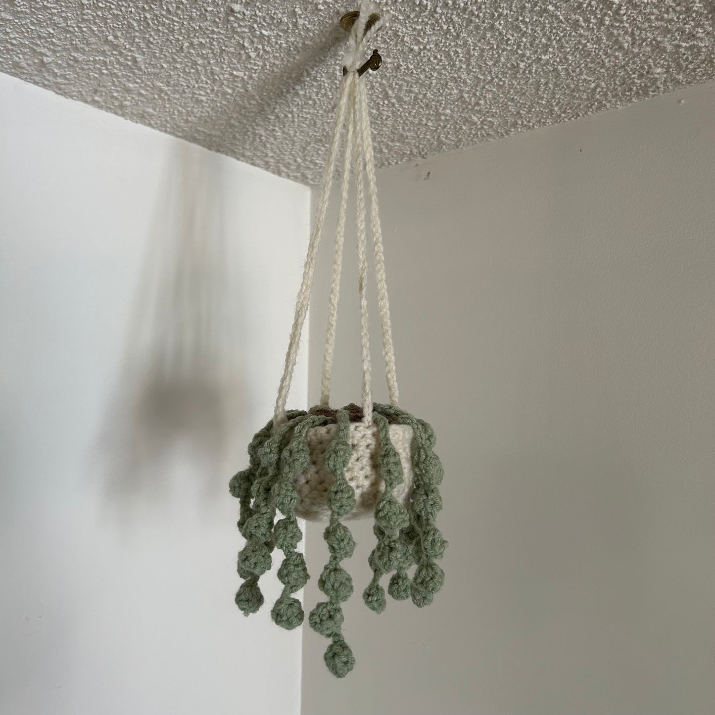 crocheted string of pearls