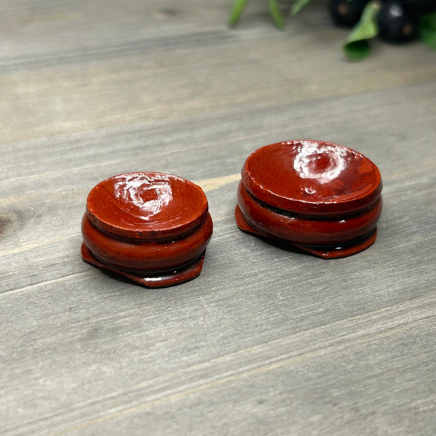 round wooden sphere stand