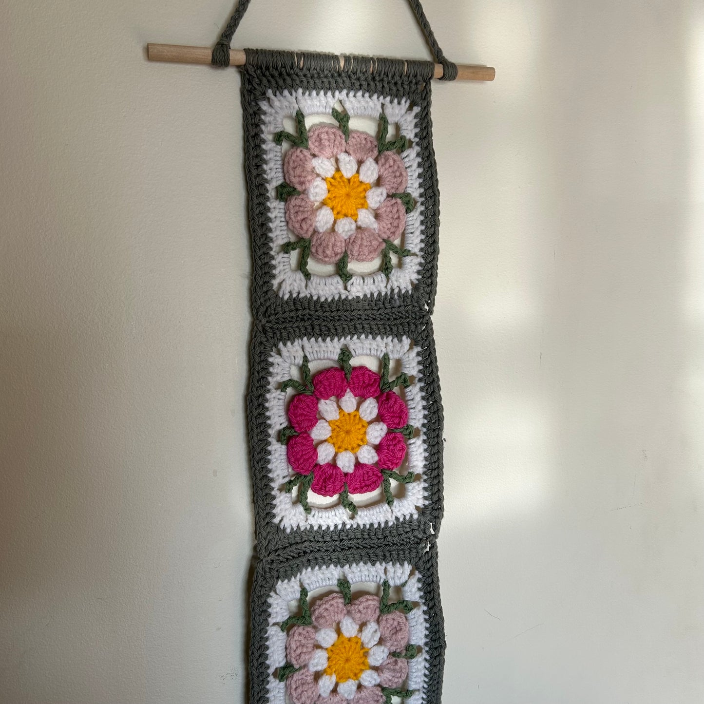 floral crochet wall hanging