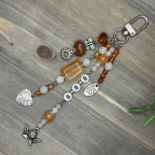 carnelian & clear quartz bag charm