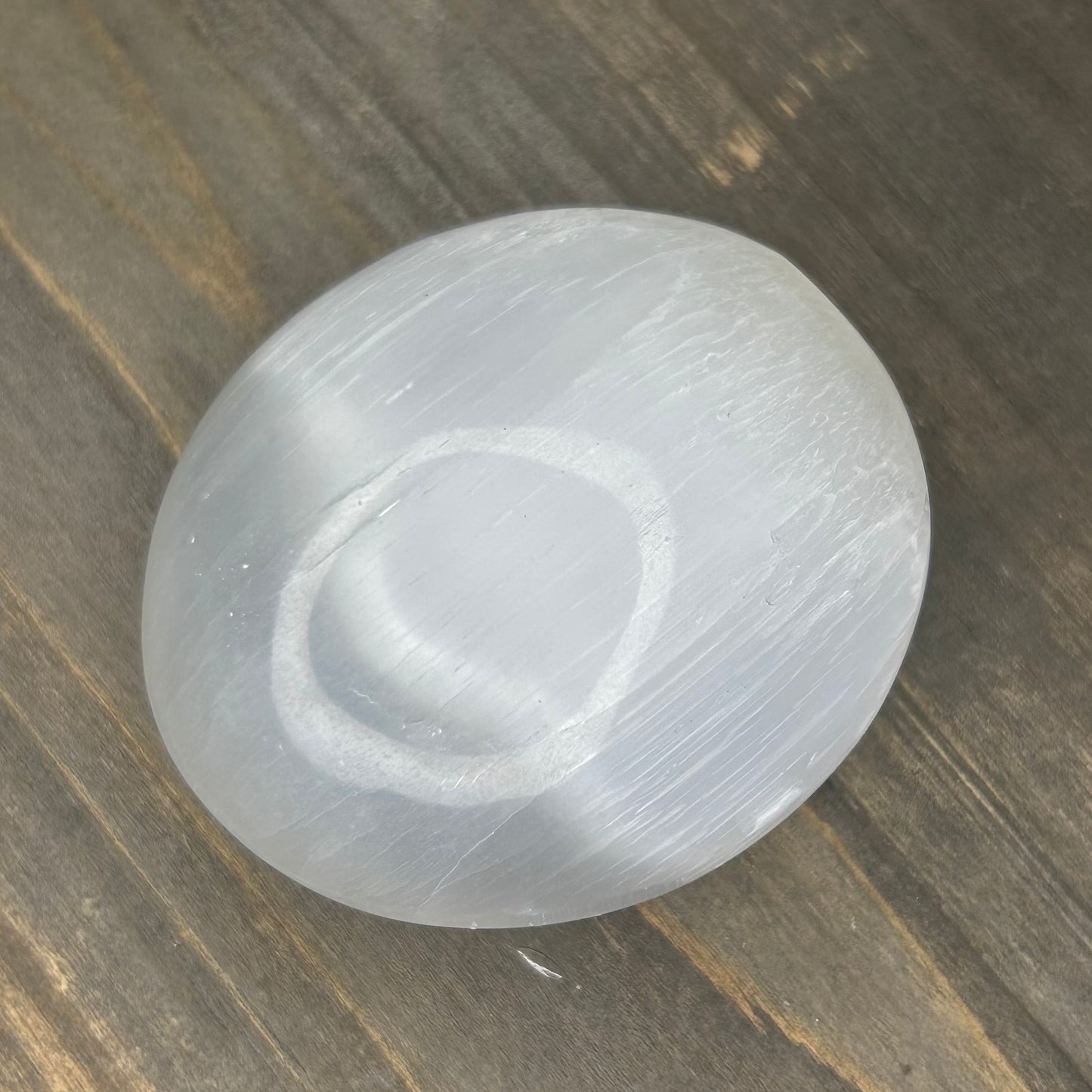 selenite palm stone