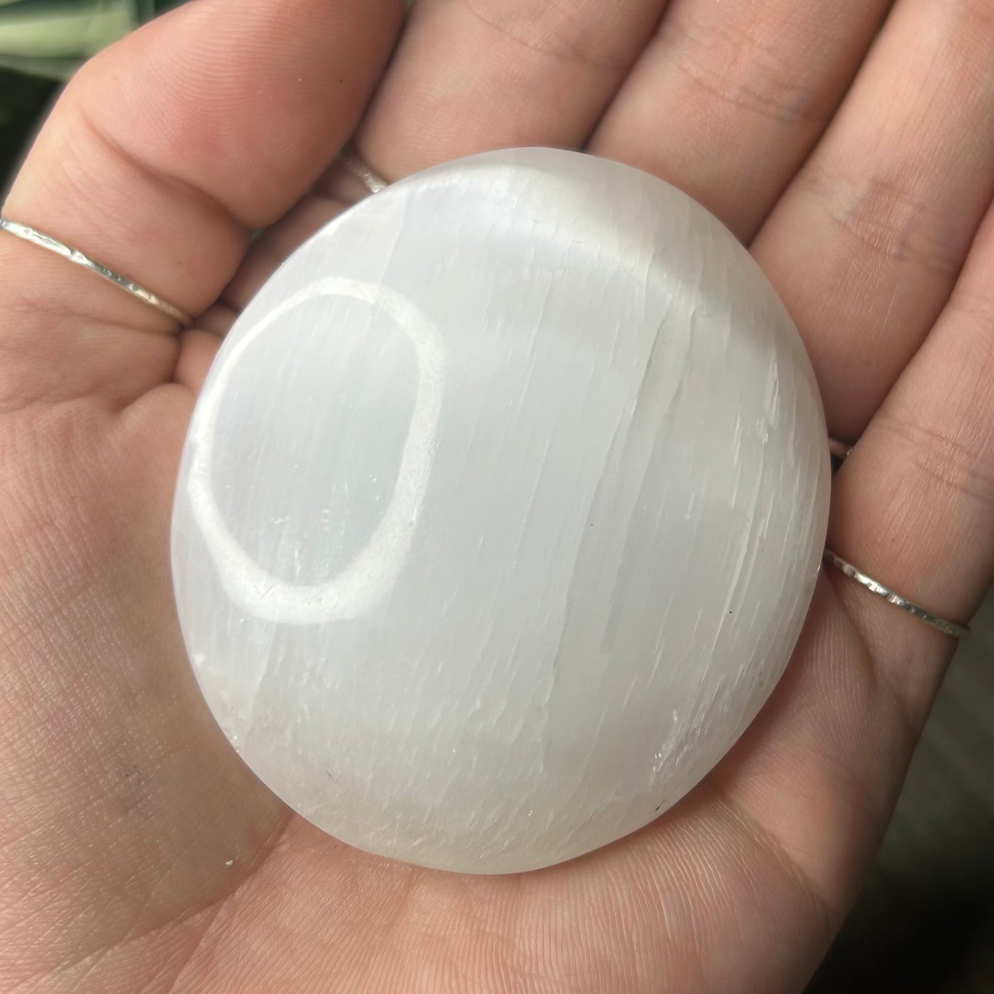 selenite palm stone