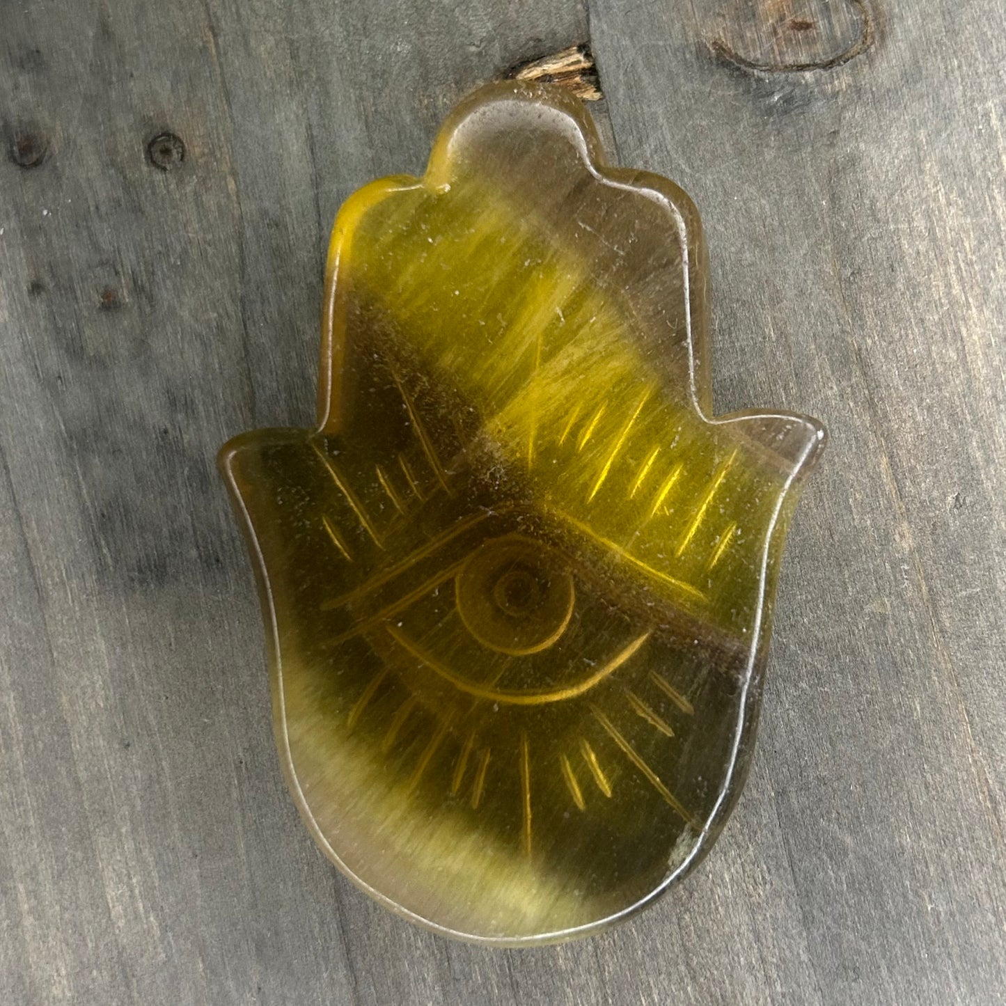 yellow fluorite hamsa hand