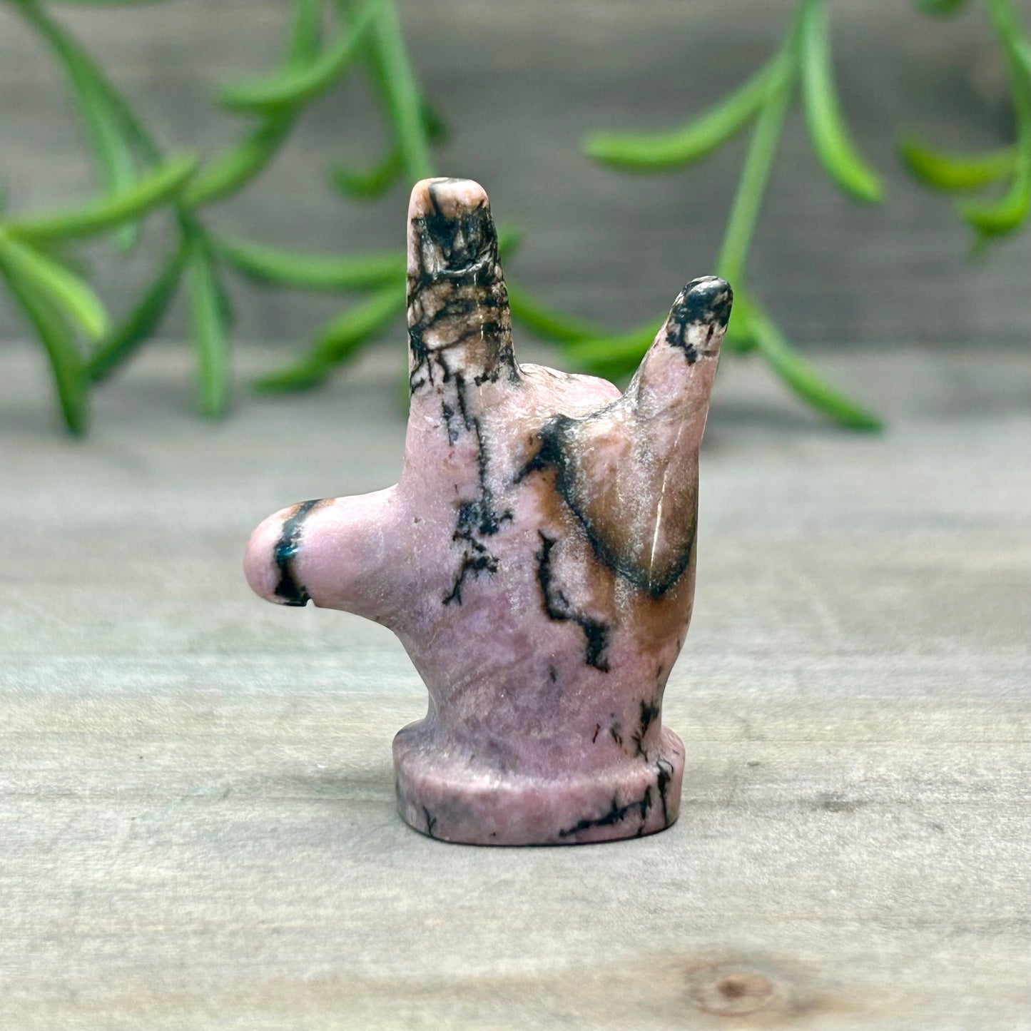 rhodonite hand