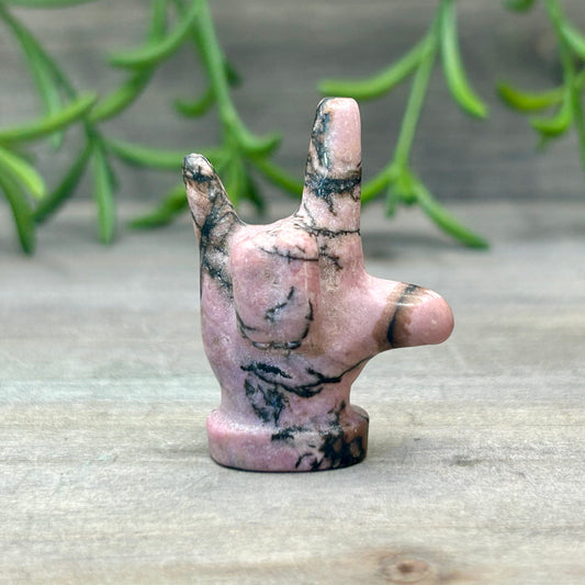 rhodonite hand