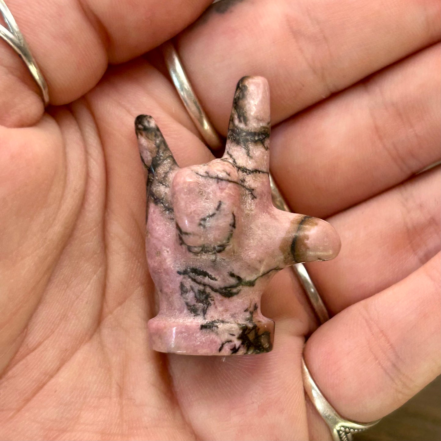 rhodonite hand