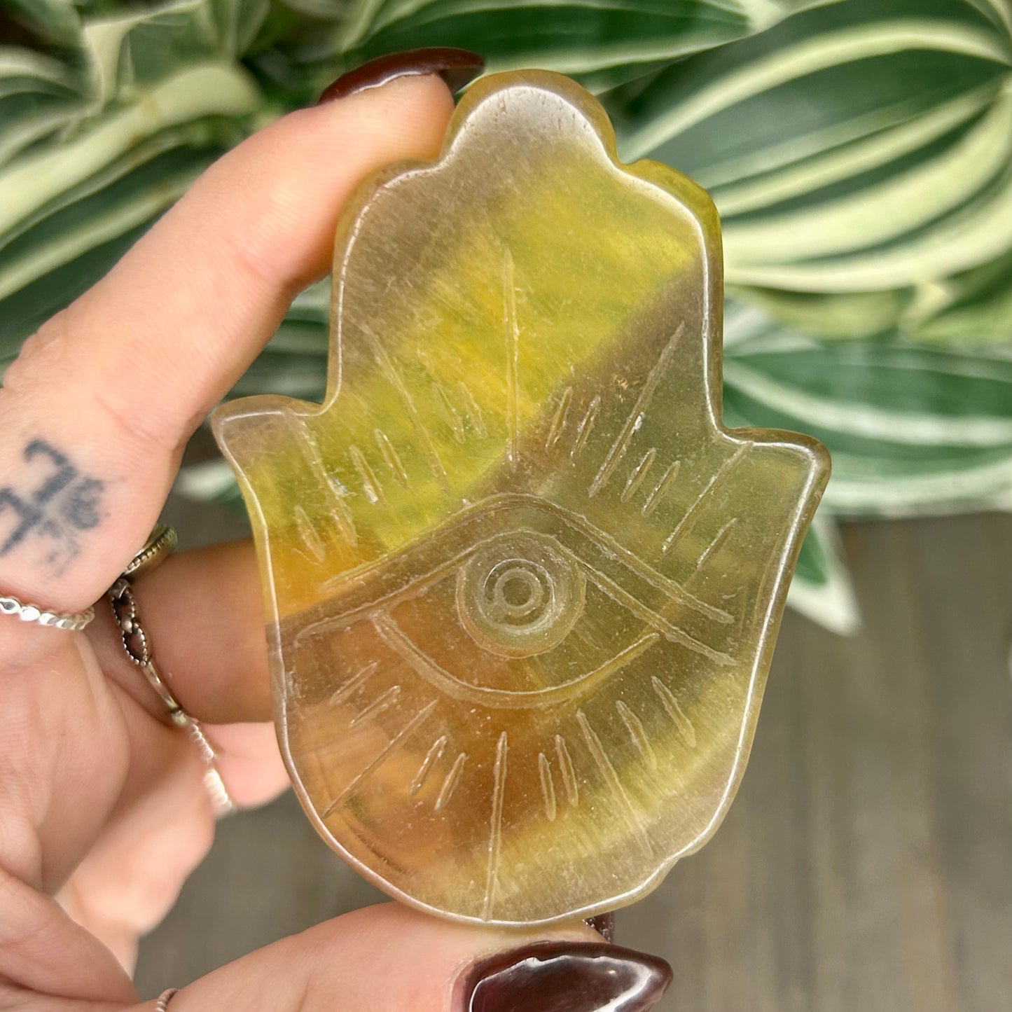 yellow fluorite hamsa hand