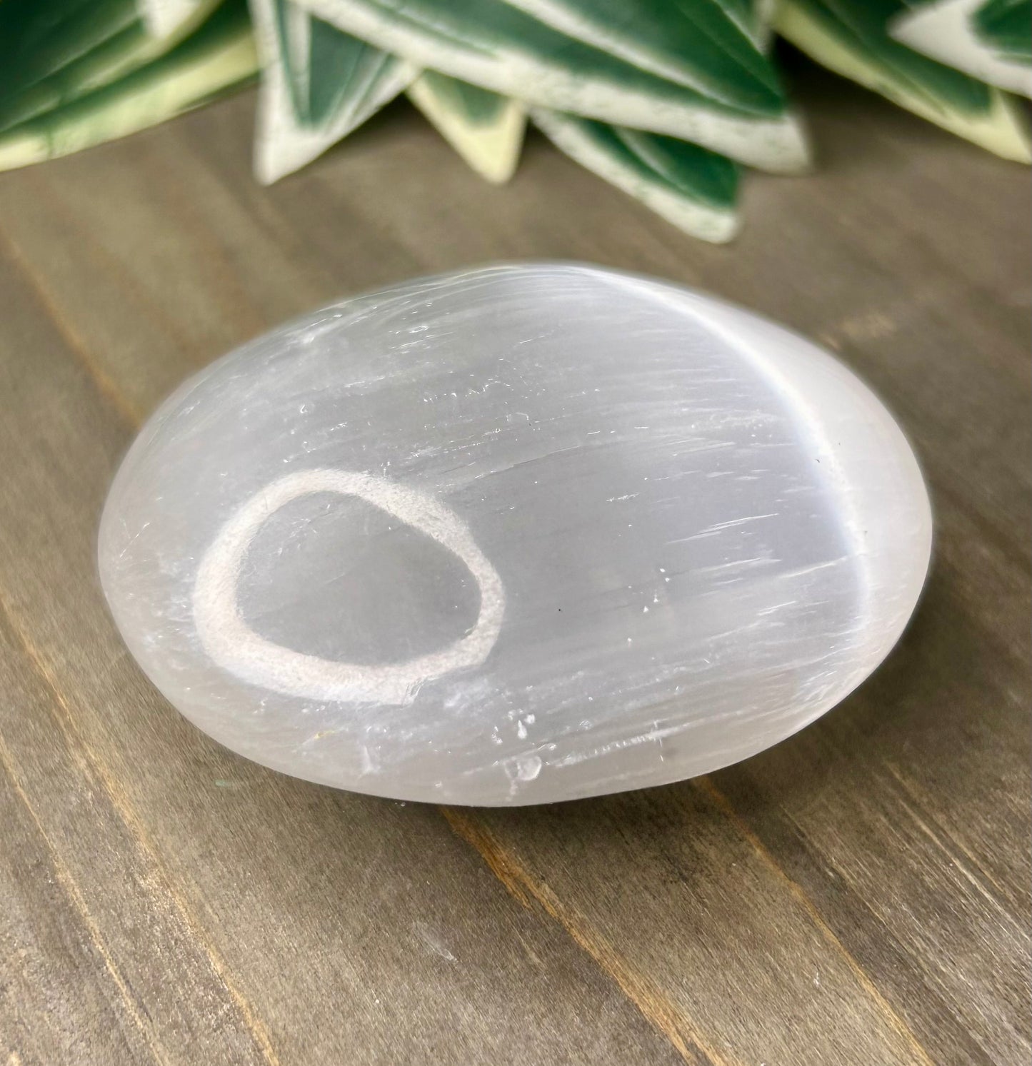 selenite palm stone