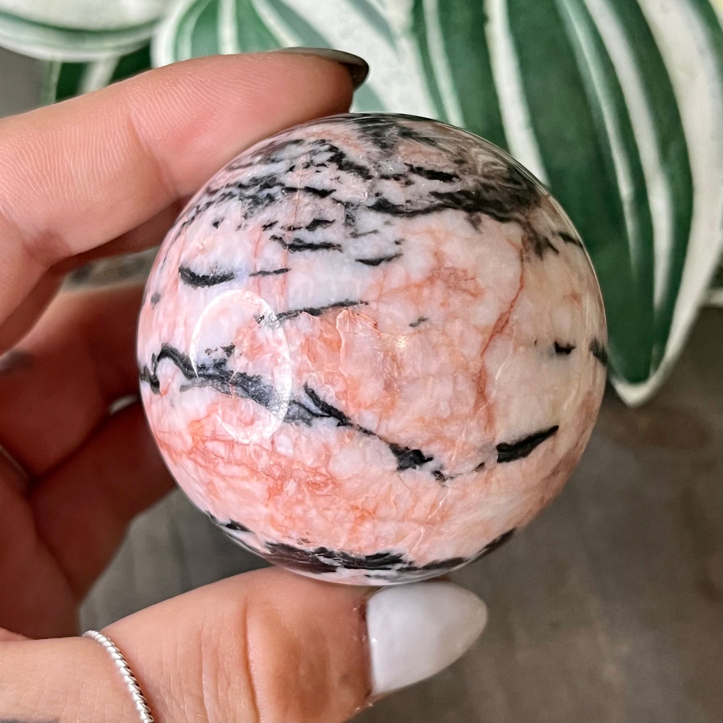 pink zebra jasper sphere