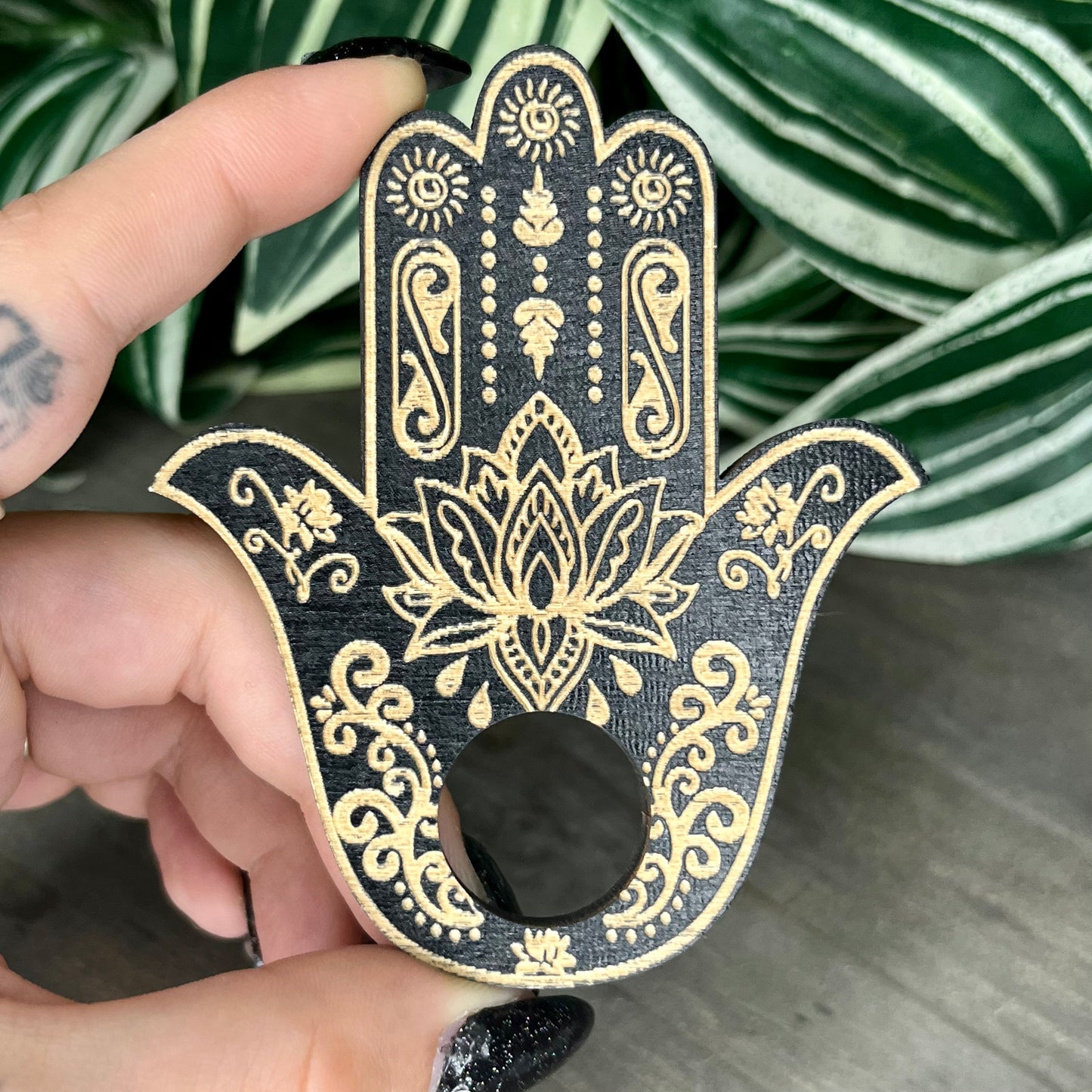 wooden hamsa hand sphere stand