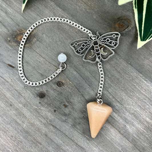 orange calcite pendulum