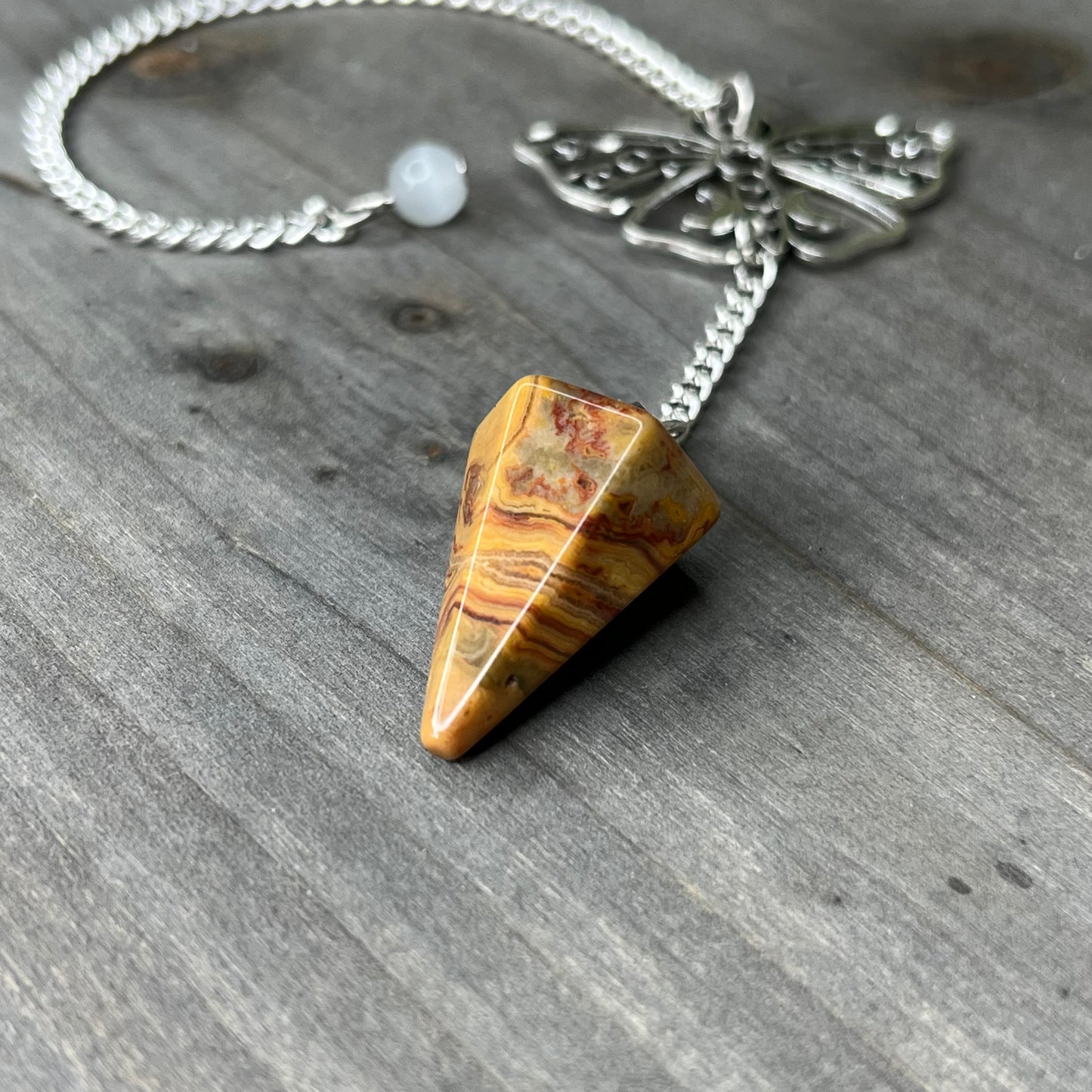 crazy lace agate pendulum