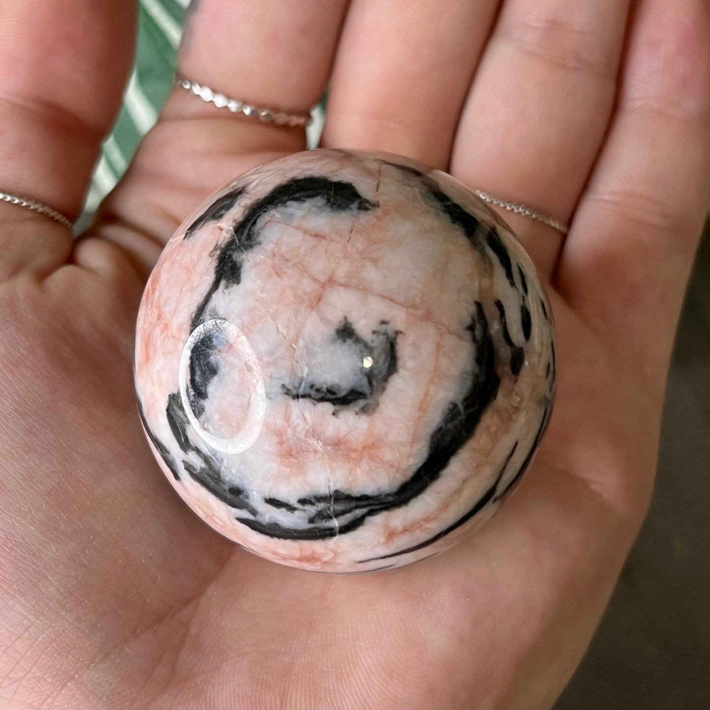 small pink zebra jasper sphere