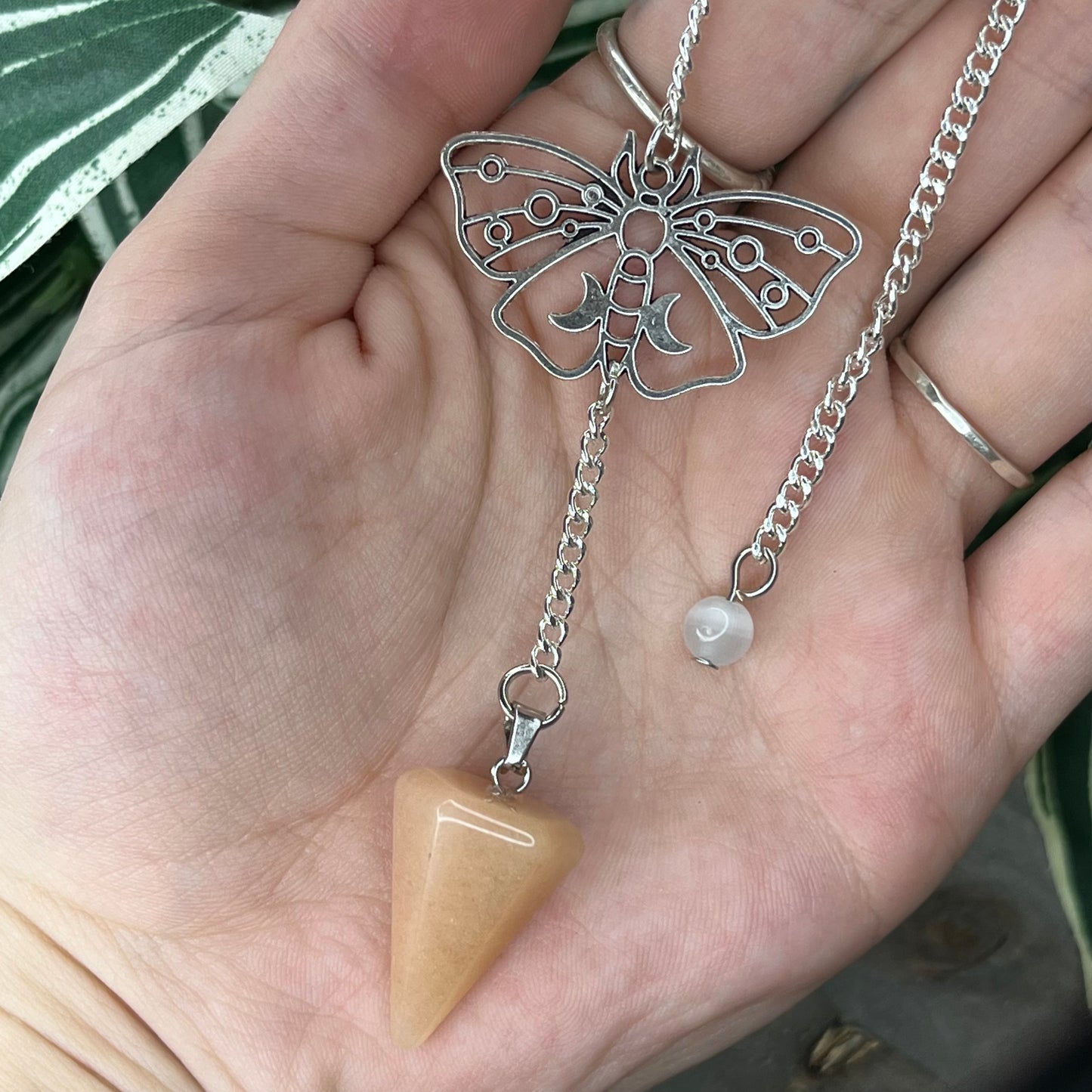 orange calcite pendulum